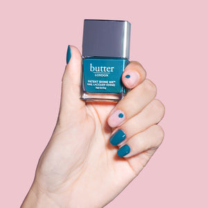 butter LONDON - Bang On! (Turquoise) Patent Shine 10X Nail Lacquer - Lifestyle Image - Full White Background.