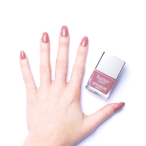 butter LONDON - Mums The Word (Nude Pink) Patent Shine 10X Nail Lacquer - Lifestyle Image - Full White Background.